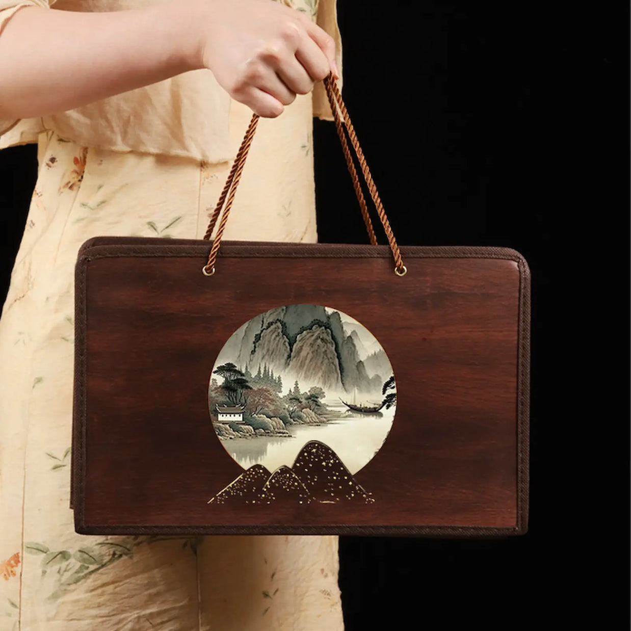 Luxury Bi Luo Chun green tea gift box with traditional Chinese landscape painting design on a wooden case, featuring elegant craftsmanship and sturdy rope handles. Ideal for gifting premium Chinese tea on special occasions.
