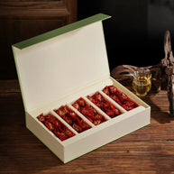 Premium Anxi Tie Guan Yin oolong tea gift box with individually wrapped tea packets, elegant design perfect for gifting or storing authentic Chinese oolong tea. Ideal for tea lovers and special occasions.
